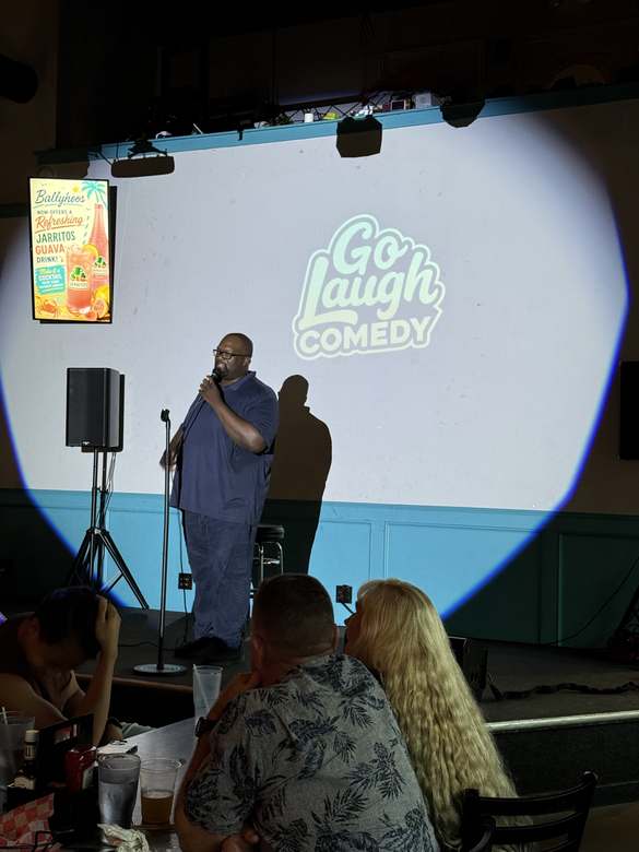 Comedian performing in the spotlight at Ballyhoos