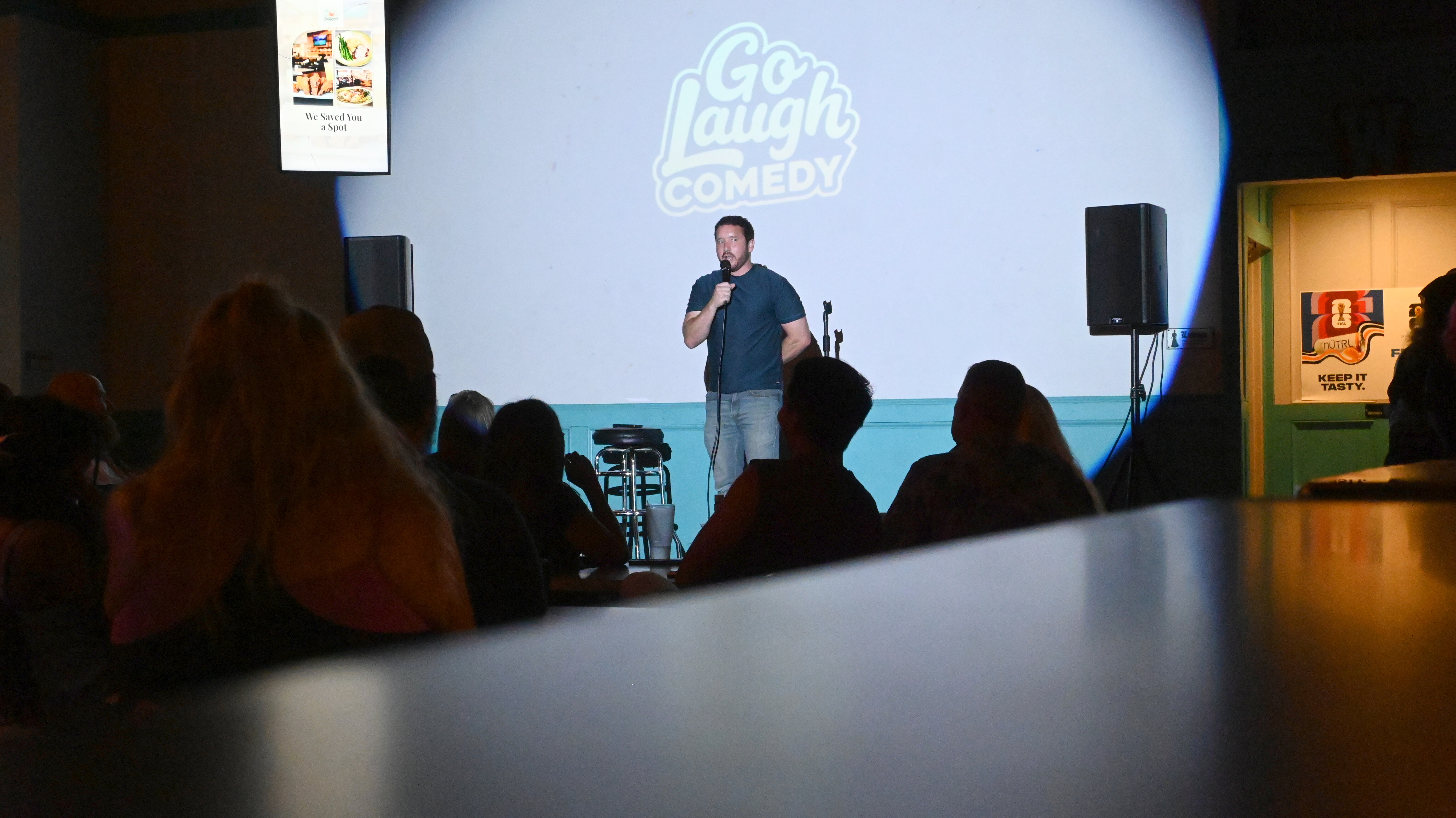 Comedian performing with the crowd at Ballyhoos