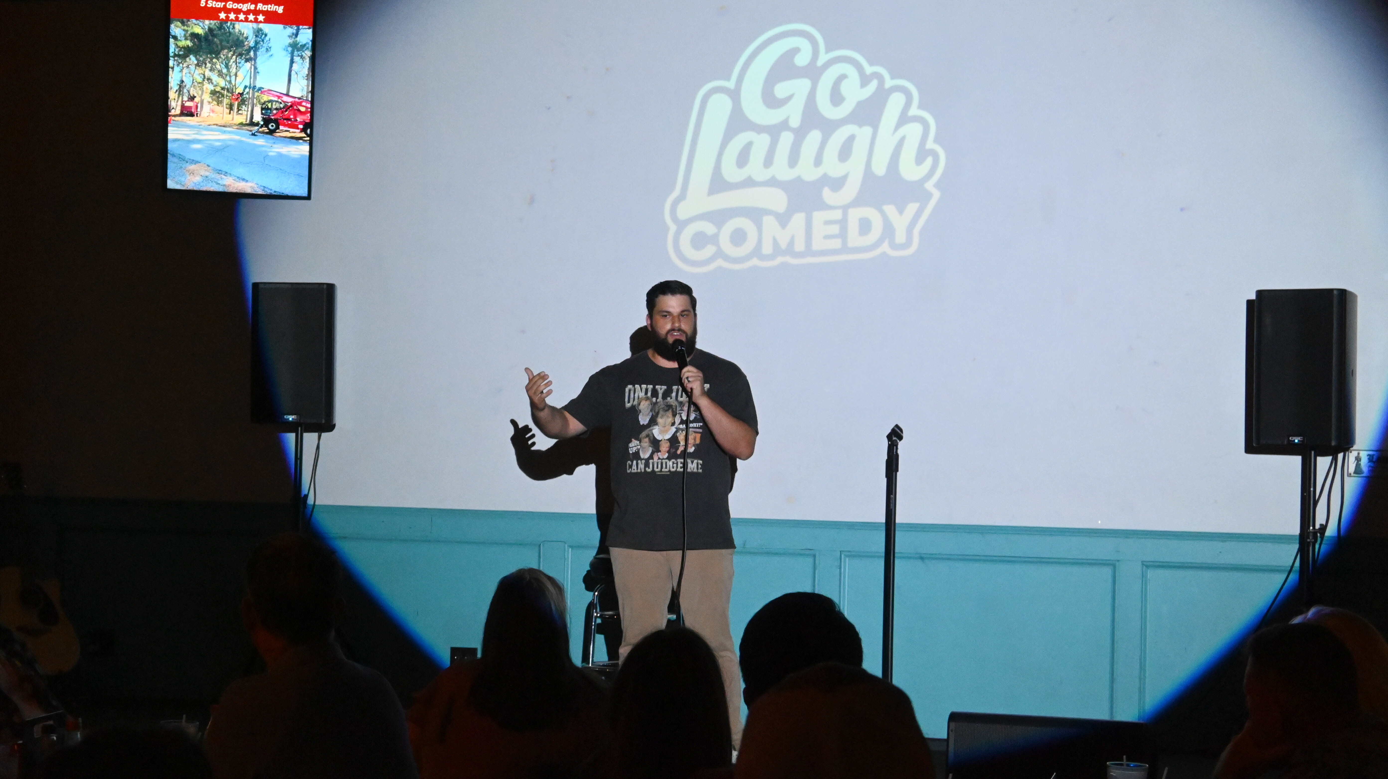 Comedian performing at Go Laugh Comedy night at Ballyhoos