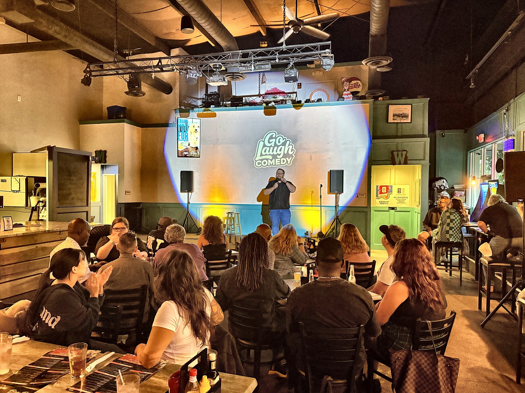 Crowd watching a comedian perform at Go Laugh Comedy night at Ballyhoos