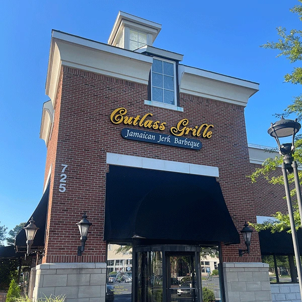 The Cutlass Grille sign — Jamaican Jerk Barbeque