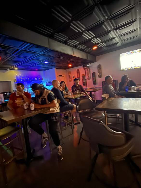 Audience watching the show at Duck Dive Tavern
