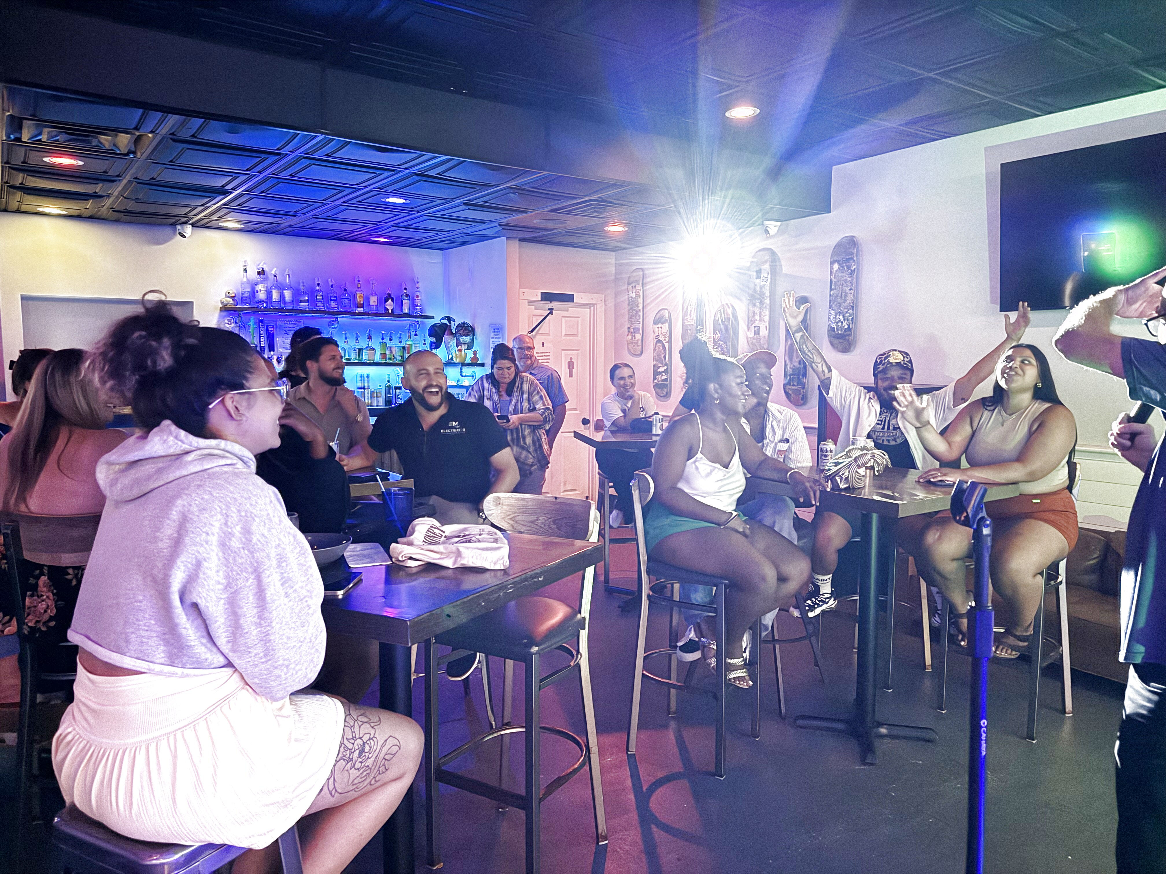 Comedian performing at Duck Dive Tavern open mic