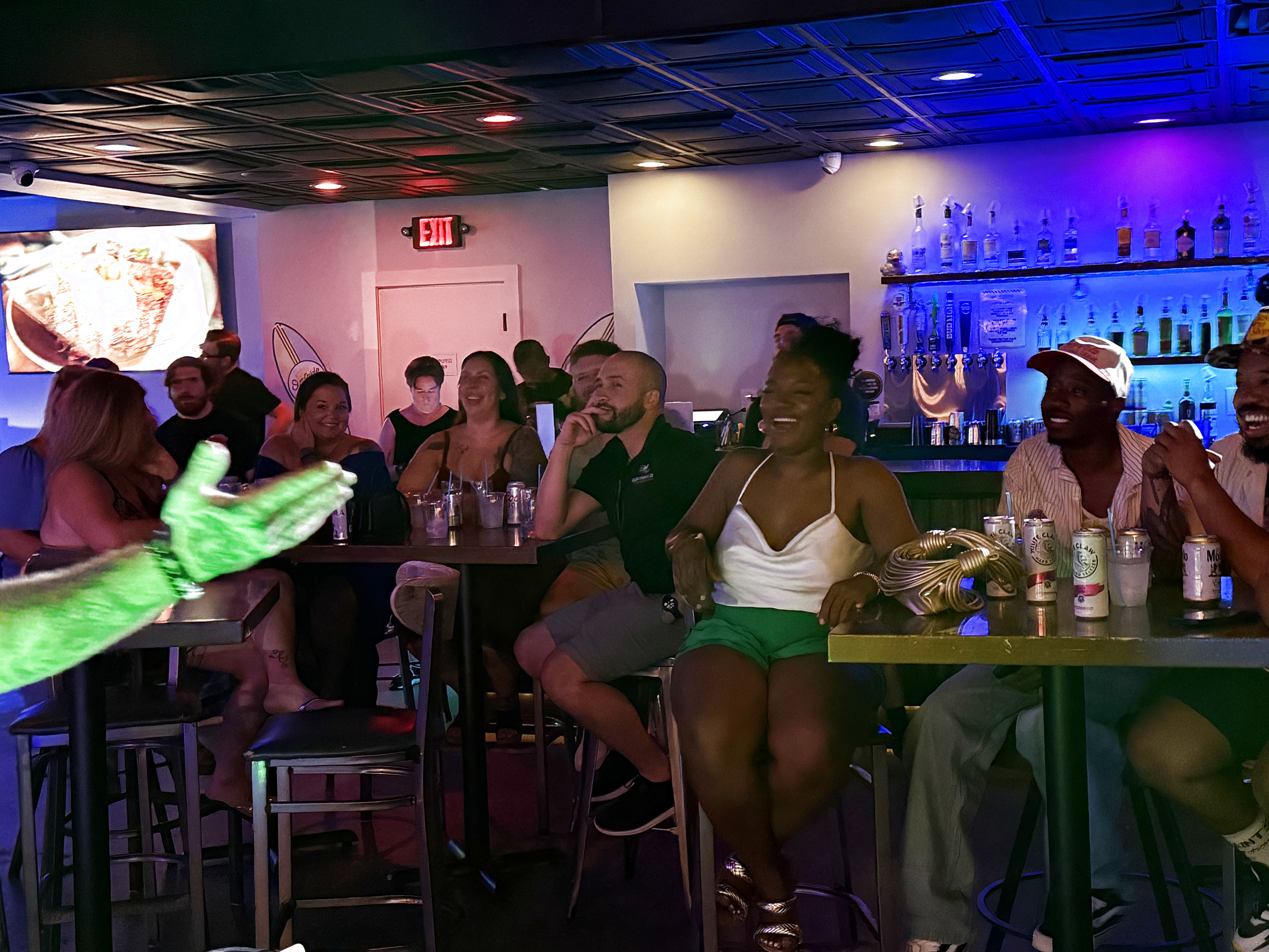Comedian performing at Duck Dive Tavern open mic