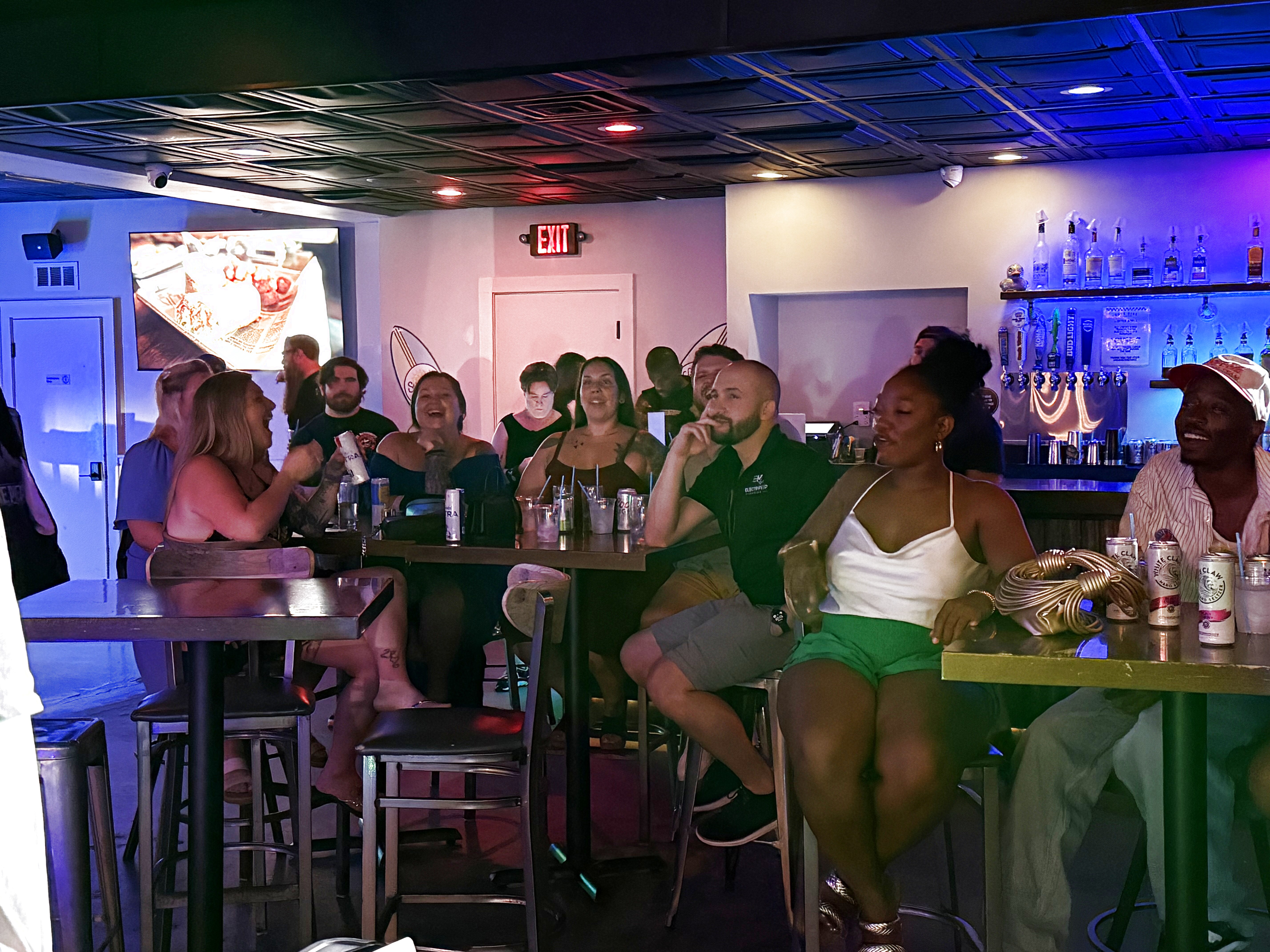 Comedian performing at Duck Dive Tavern open mic