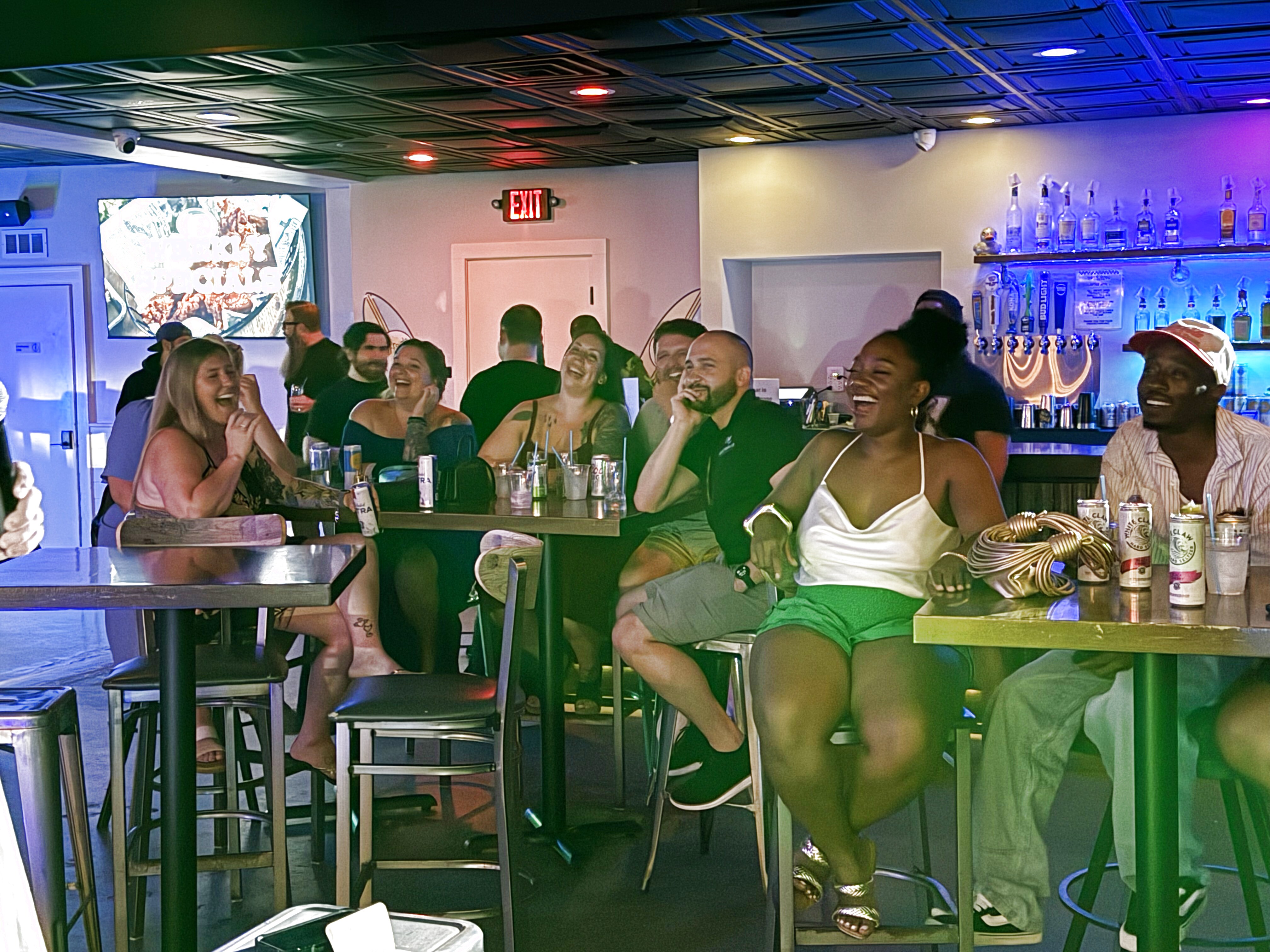 Comedian performing at Duck Dive Tavern open mic