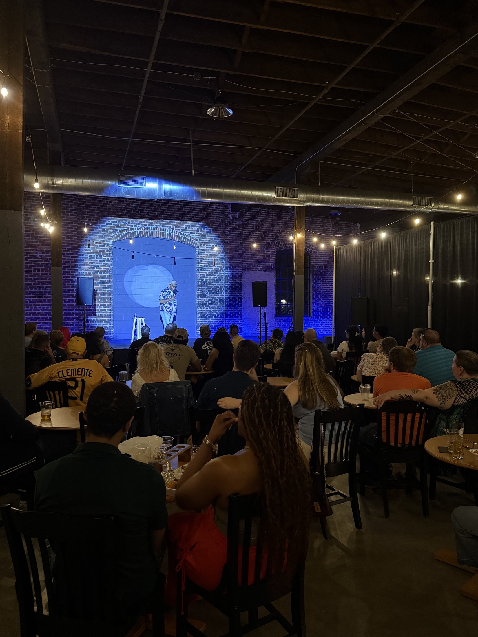 Comedian performing at Go Laugh Comedy night at Maker's Craft Brewery